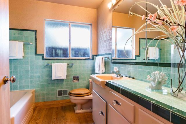 a room with a sink and a toilet