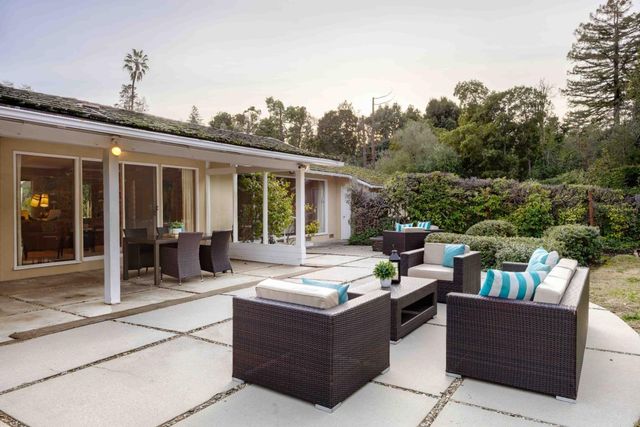 a view of a couches in patio of house
