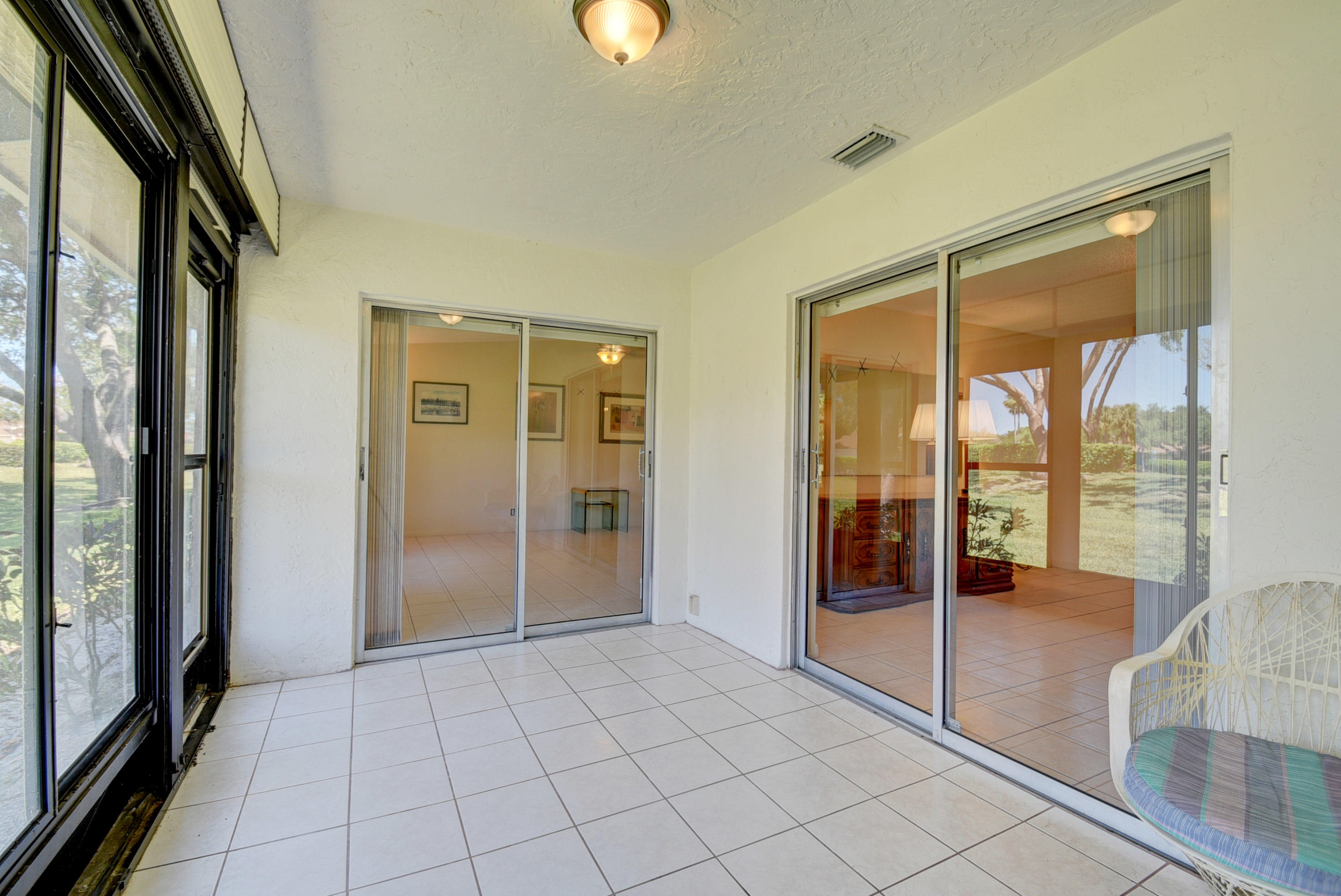 8187 Sweetbriar Way Boca Raton, FL 33496 - Photo 20 of 36 Screened Patio