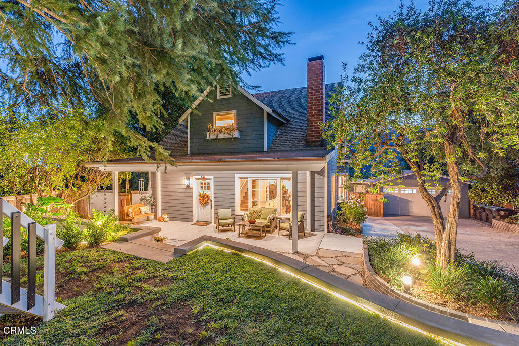 3500 Fairchild Street La Crescenta, CA 91214 - Photo 1 of 54 a front view of a house with a yard table and chairs