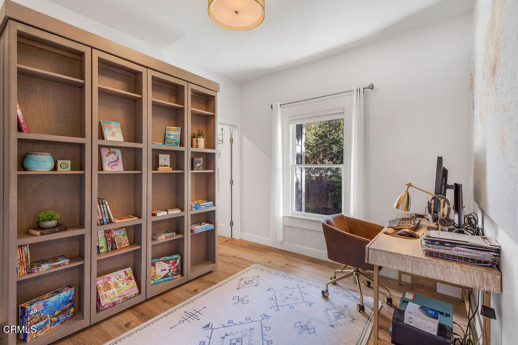 3500 Fairchild Street La Crescenta, CA 91214 - Photo 13 of 54 a view of a workspace with furniture and a window