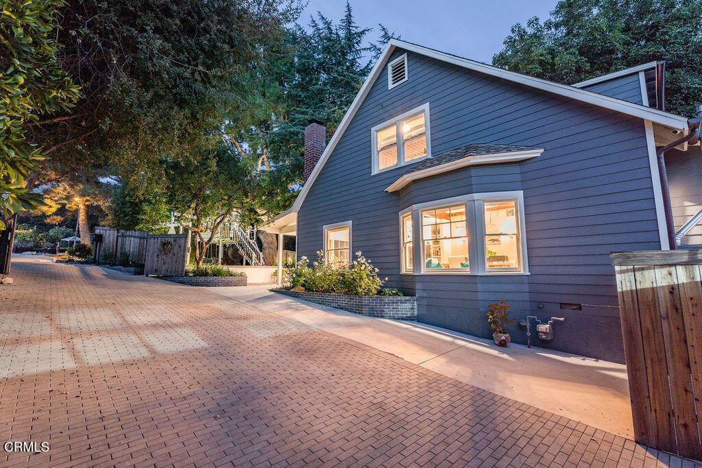 3500 Fairchild Street La Crescenta, CA 91214 - Photo 24 of 54 a front view of a house with basket ball court and outdoor seating
