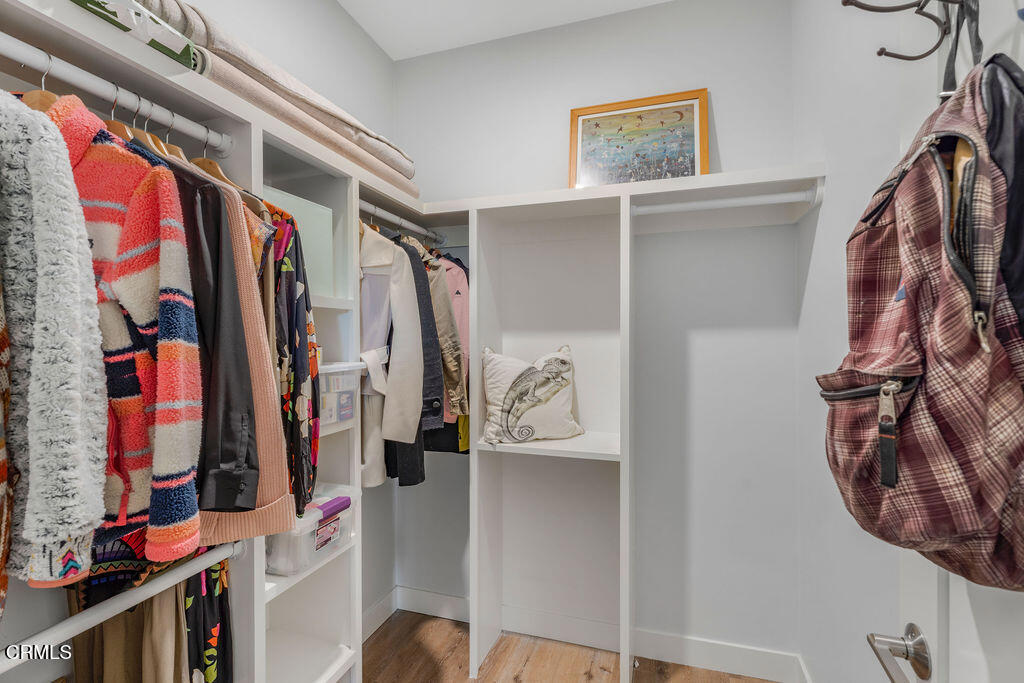 3500 Fairchild Street La Crescenta, CA 91214 - Photo 29 of 54 a view of walk in closet with clothes and shoes