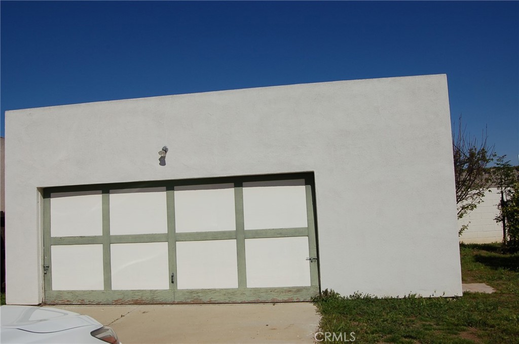 7731 Evans Street Riverside, CA 92504 - Photo 14 of 22 a view of wooden floor and a large window