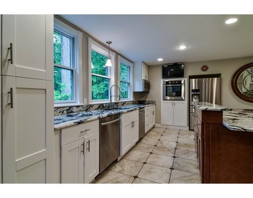 75 Evergreen Road Natick, MA 01760 - Photo 11 of 36 a large white kitchen with a large window