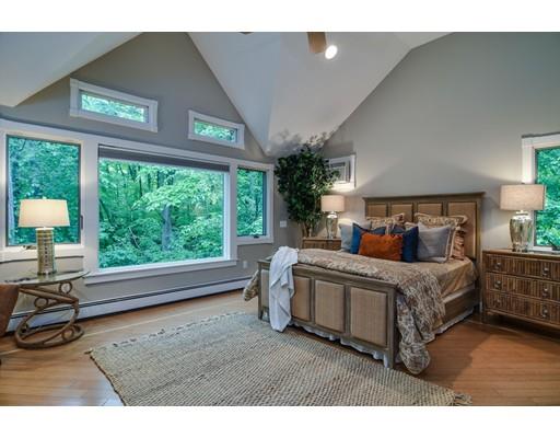 75 Evergreen Road Natick, MA 01760 - Photo 15 of 36 a bed room with a bed window and a table