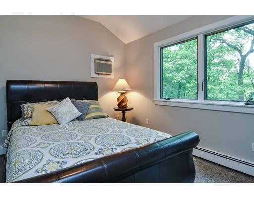 75 Evergreen Road Natick, MA 01760 - Photo 19 of 36 a bed sitting in a bedroom next to a window