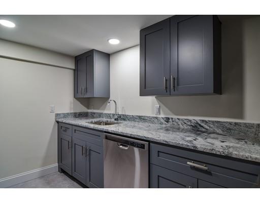 75 Evergreen Road Natick, MA 01760 - Photo 25 of 36 a bathroom with a sink and a mirror