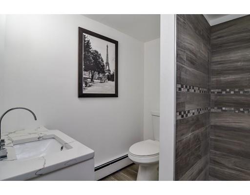 75 Evergreen Road Natick, MA 01760 - Photo 27 of 36 a bathroom with a toilet sink and shower