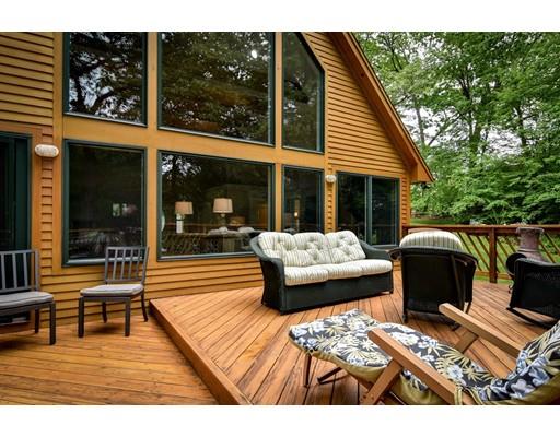 75 Evergreen Road Natick, MA 01760 - Photo 28 of 36 a balcony view with a couch and wooden floor