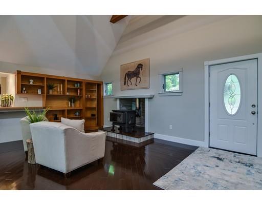 75 Evergreen Road Natick, MA 01760 - Photo 4 of 36 a living room with furniture a window and kitchen view