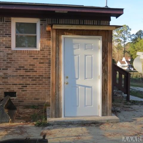 76 Mackeys Road Plymouth, NC 27962 - Photo 23 of 23 Storage room on rear with Hot Water Heater inside