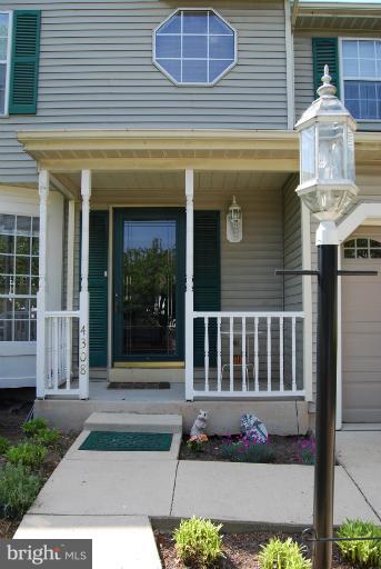4308 Spring Avenue Halethorpe, MD 21227 - Photo 1 of 21 a front view of a house with a garden