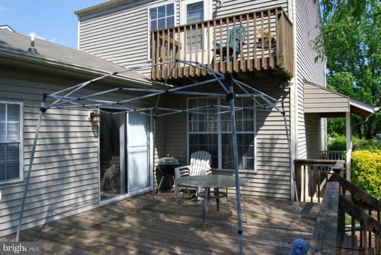 4308 Spring Avenue Halethorpe, MD 21227 - Photo 16 of 21 a patio with table and chairs