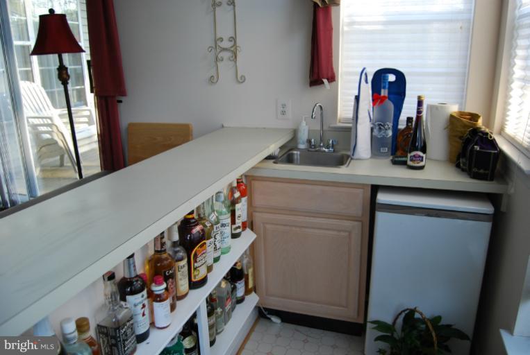 4308 Spring Avenue Halethorpe, MD 21227 - Photo 19 of 21 a bathroom with a sink and a mirror
