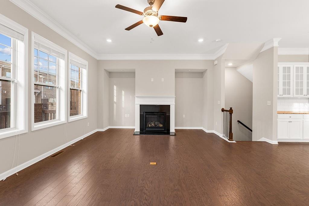 759 Topsail Lane Alpharetta, GA 30005 - Photo 11 of 50 a view of an empty room with wooden floor and a window
