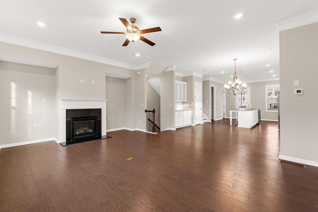 759 Topsail Lane Alpharetta, GA 30005 - Photo 12 of 50 a view of a livingroom with fireplace and wooden floor