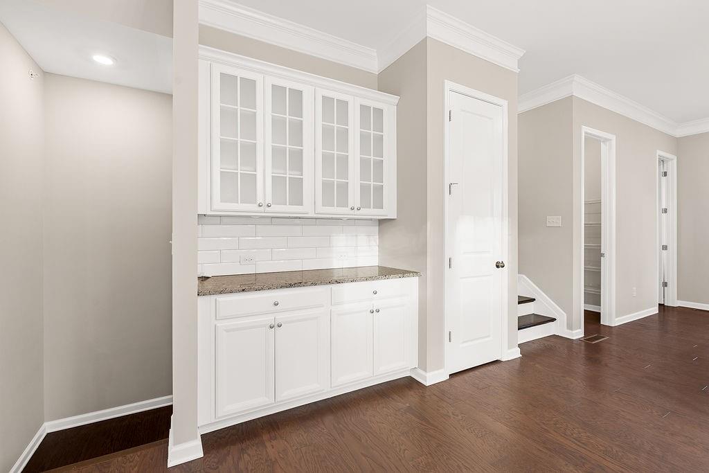 759 Topsail Lane Alpharetta, GA 30005 - Photo 17 of 50 a view of an empty room with wooden floor and a window