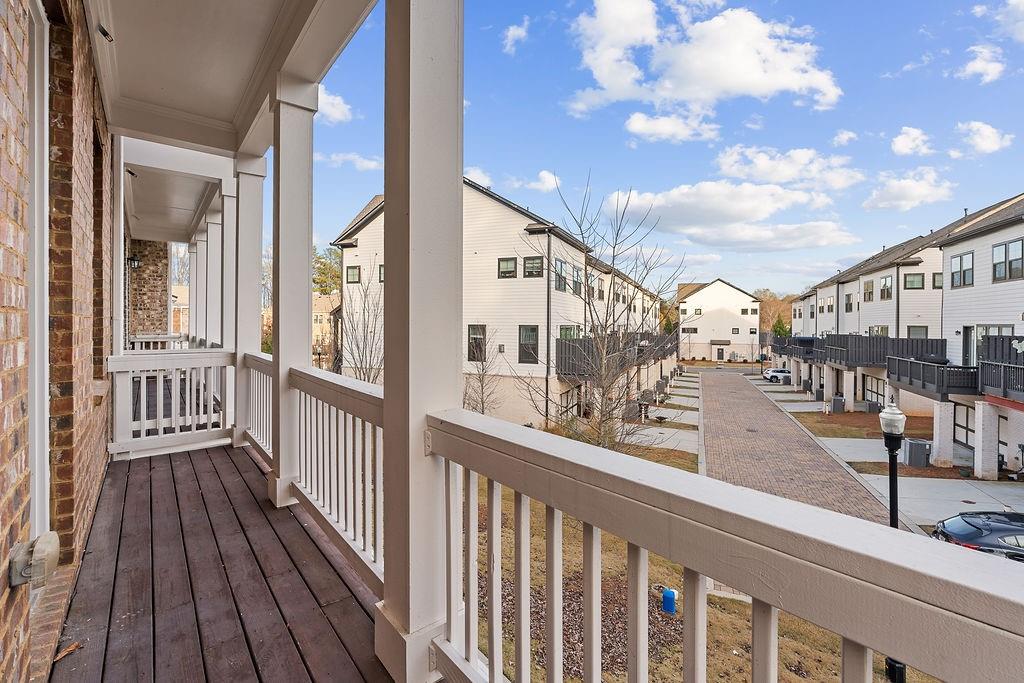 759 Topsail Lane Alpharetta, GA 30005 - Photo 24 of 50 a view of a balcony with wooden floor