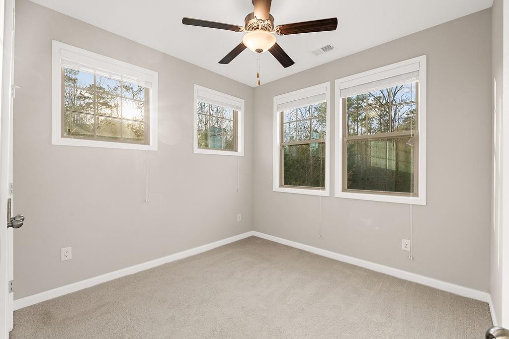 759 Topsail Lane Alpharetta, GA 30005 - Photo 35 of 50 a view of an empty room with a window