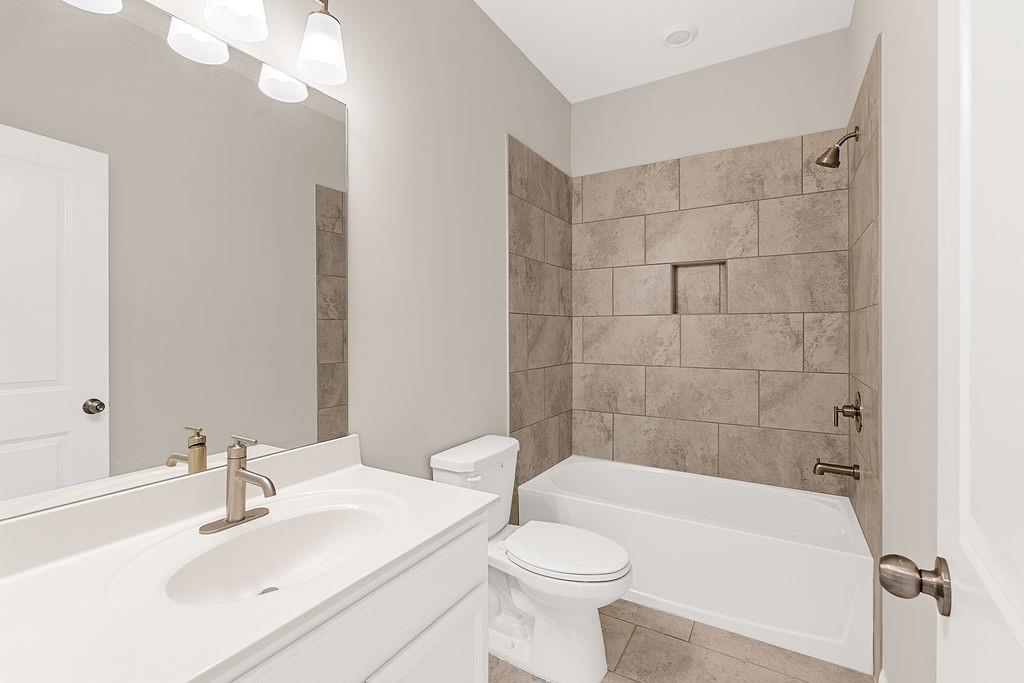 759 Topsail Lane Alpharetta, GA 30005 - Photo 39 of 50 a bathroom with a sink a toilet and shower