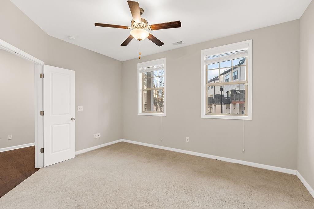 759 Topsail Lane Alpharetta, GA 30005 - Photo 7 of 50 a view of an empty room with a window