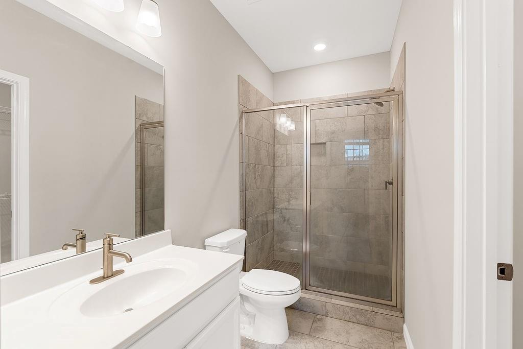 759 Topsail Lane Alpharetta, GA 30005 - Photo 8 of 50 a bathroom with a sink toilet and shower