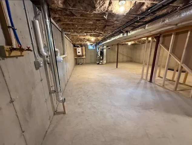 a view of an empty room with stairs