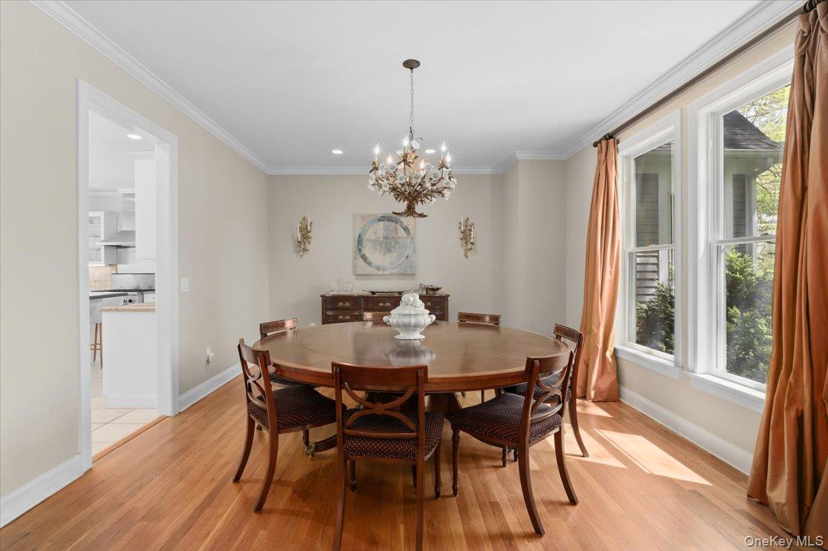 44 Scofield Road Pound Ridge, NY 10576 - Photo 11 of 36 a view of a dining room with furniture window and wooden floor