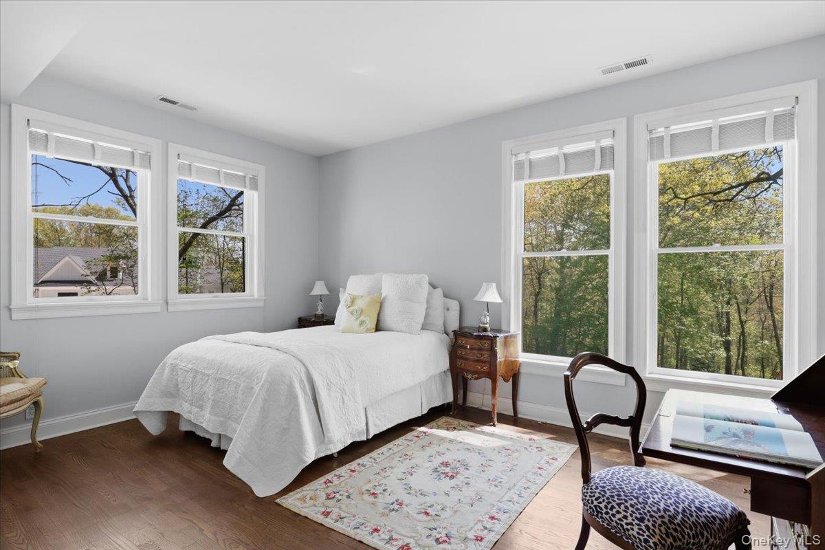 44 Scofield Road Pound Ridge, NY 10576 - Photo 14 of 36 a bedroom with a bed and a window