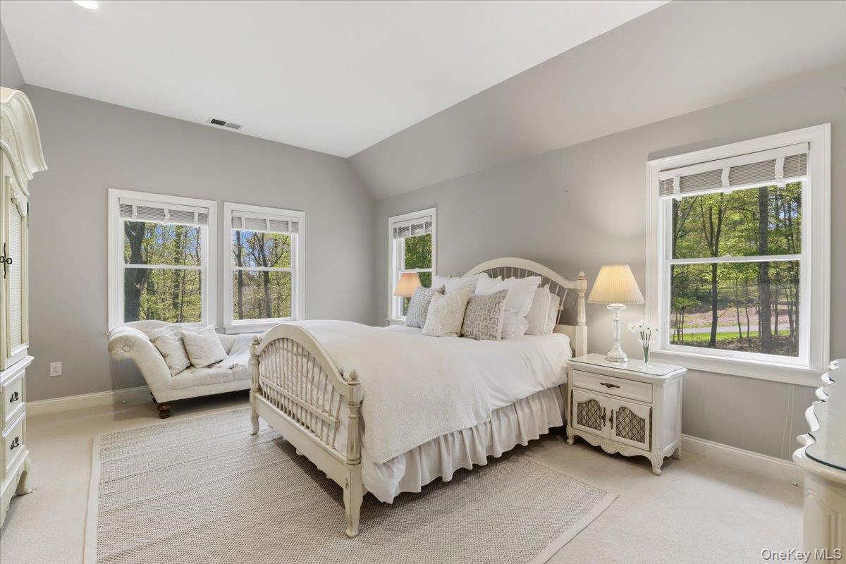 44 Scofield Road Pound Ridge, NY 10576 - Photo 18 of 36 a bedroom with a bed and a window