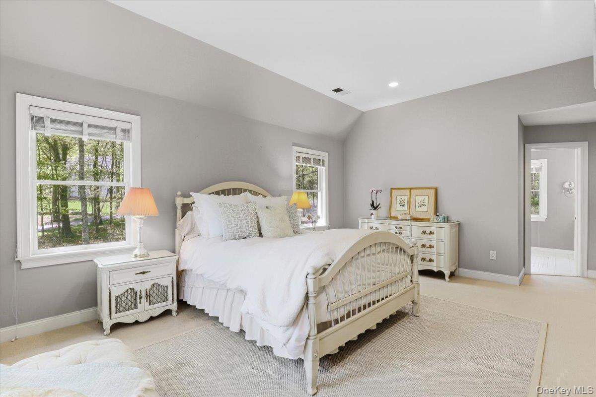44 Scofield Road Pound Ridge, NY 10576 - Photo 19 of 36 a bedroom with a bed and a window