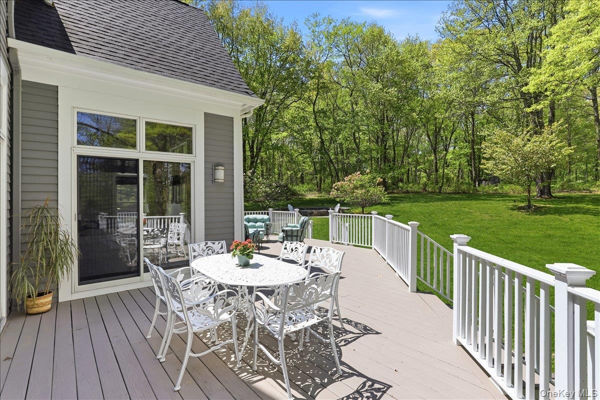 44 Scofield Road Pound Ridge, NY 10576 - Photo 27 of 36 a view of a patio with a yard