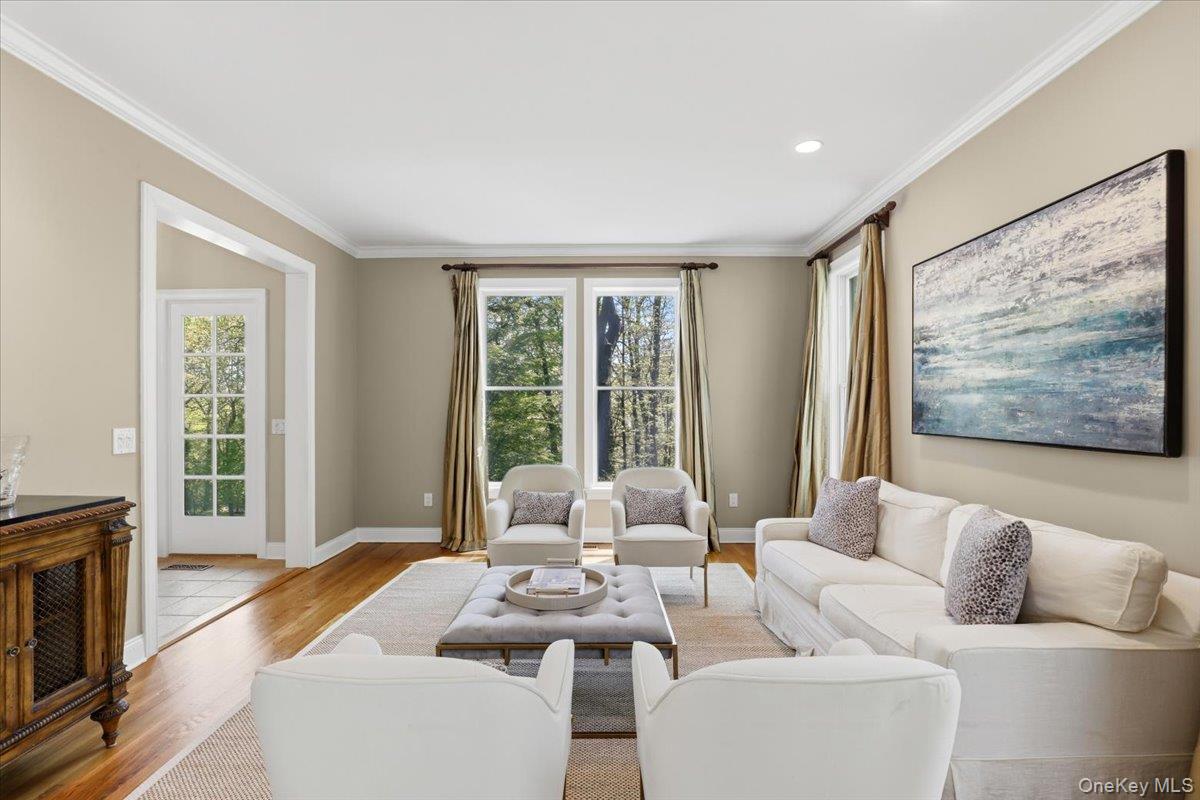 44 Scofield Road Pound Ridge, NY 10576 - Photo 4 of 36 a living room with furniture and a large window