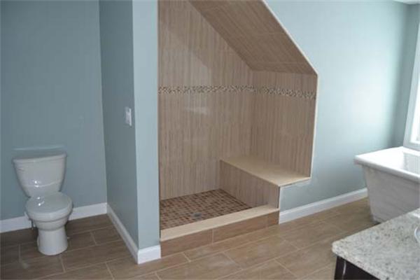 1 Henderson Avenue Andover, MA 01810 - Photo 20 of 26 a bathroom with a toilet and a shower