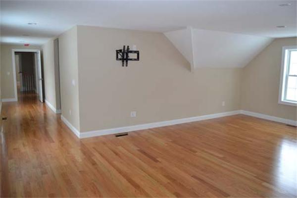 1 Henderson Avenue Andover, MA 01810 - Photo 24 of 26 wooden floor in an empty room with a window