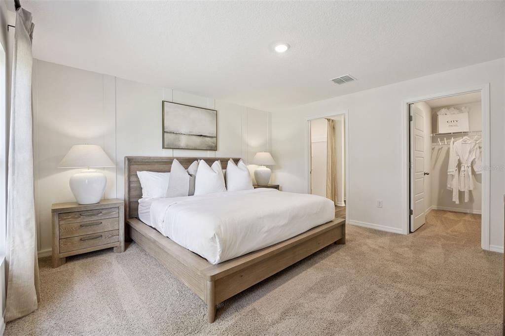 3419 Nettle Loop Tavares, FL 32778 - Photo 15 of 29 a bedroom with bed and window