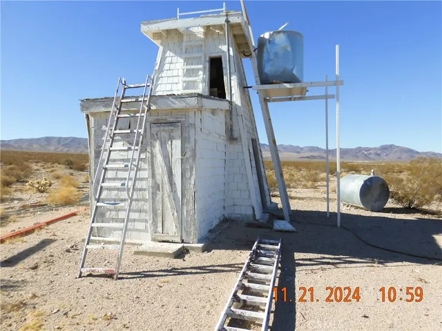 a view of a living room with furniture