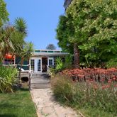 a view of a backyard with patio