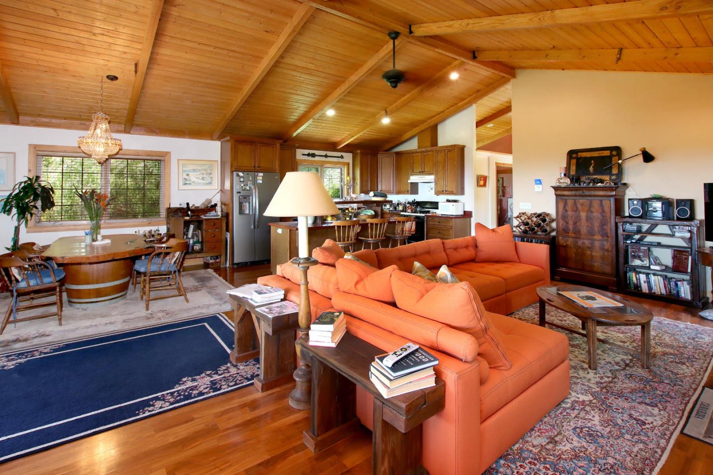 434 Old Smith Road Watsonville, CA 95076 - Photo 13 of 61 a living room with furniture a flat screen tv and floor to ceiling window