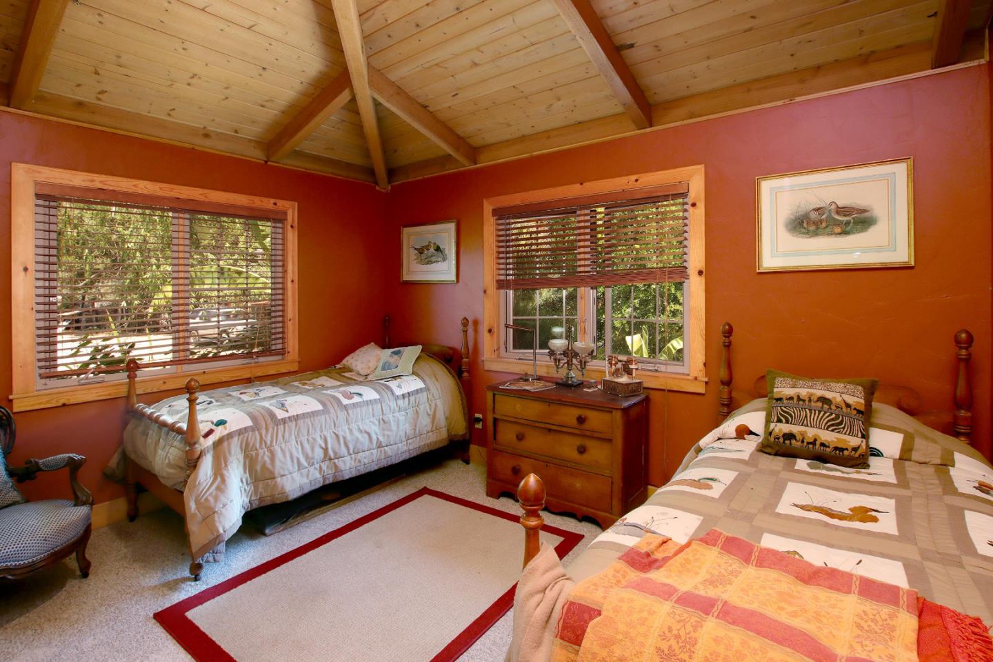 434 Old Smith Road Watsonville, CA 95076 - Photo 28 of 61 a bed sitting in a bedroom next to a window