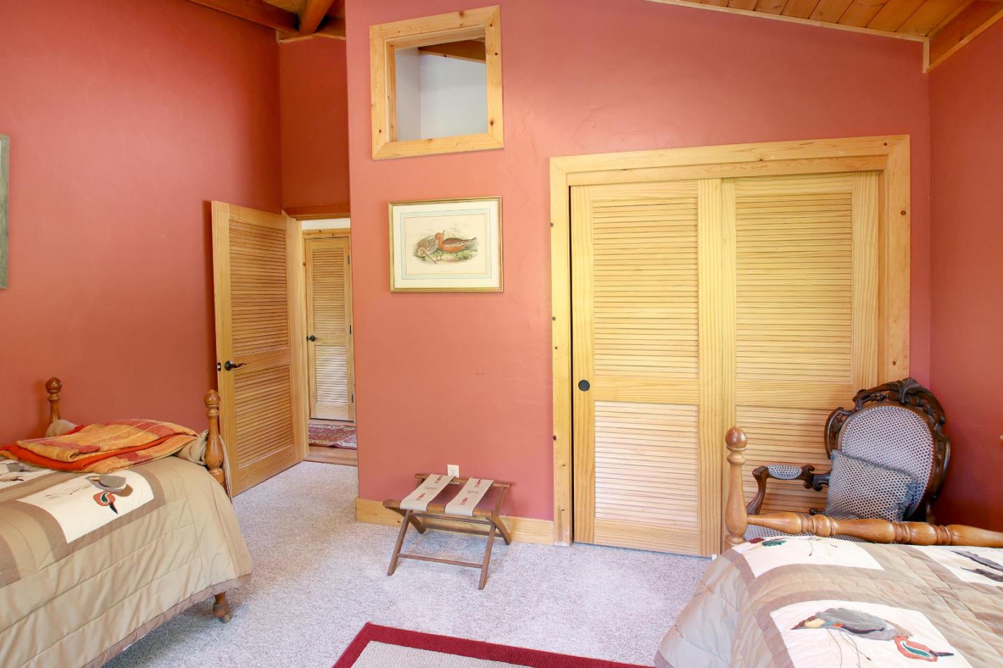 434 Old Smith Road Watsonville, CA 95076 - Photo 29 of 61 a bedroom with a bed chair and a window