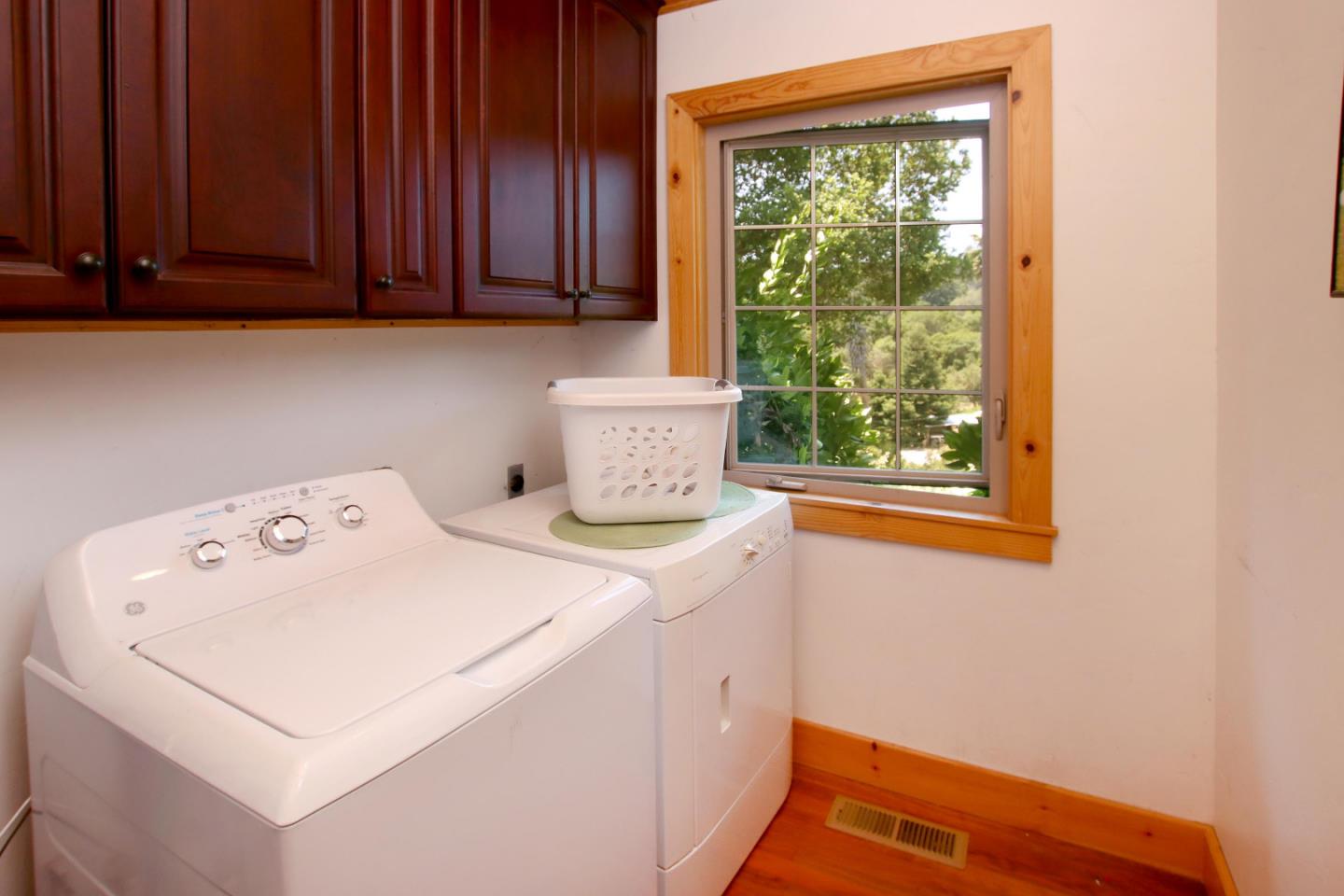 434 Old Smith Road Watsonville, CA 95076 - Photo 32 of 61 a utility room with dryer and washer