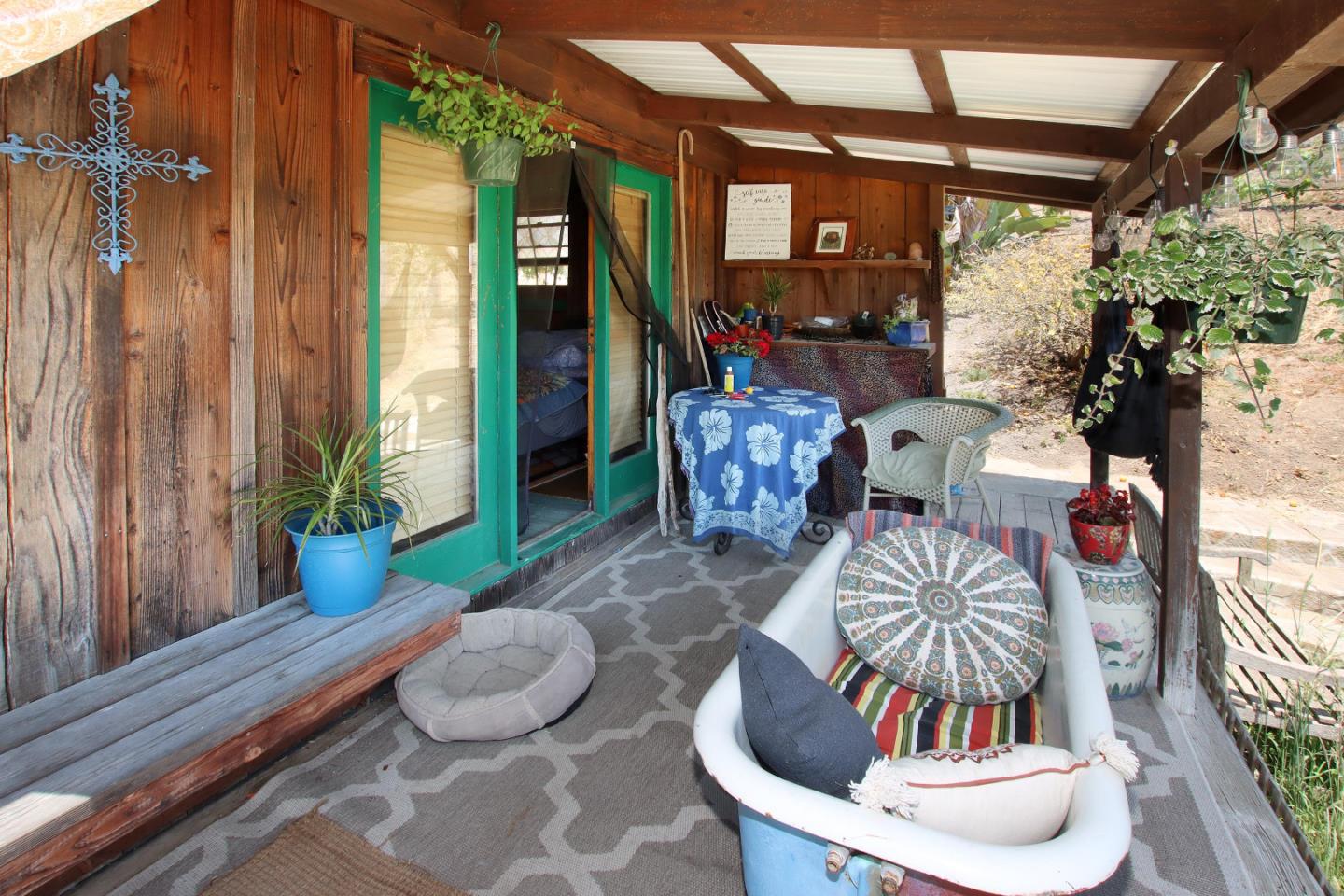 434 Old Smith Road Watsonville, CA 95076 - Photo 41 of 61 a outdoor living space with furniture and a potted plant