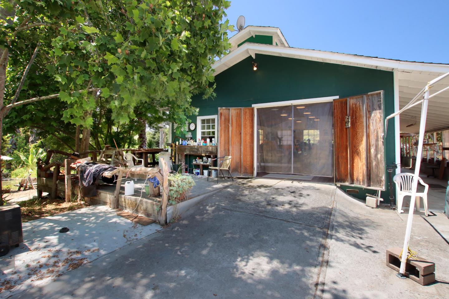 434 Old Smith Road Watsonville, CA 95076 - Photo 42 of 61 a view of a house with backyard and sitting area