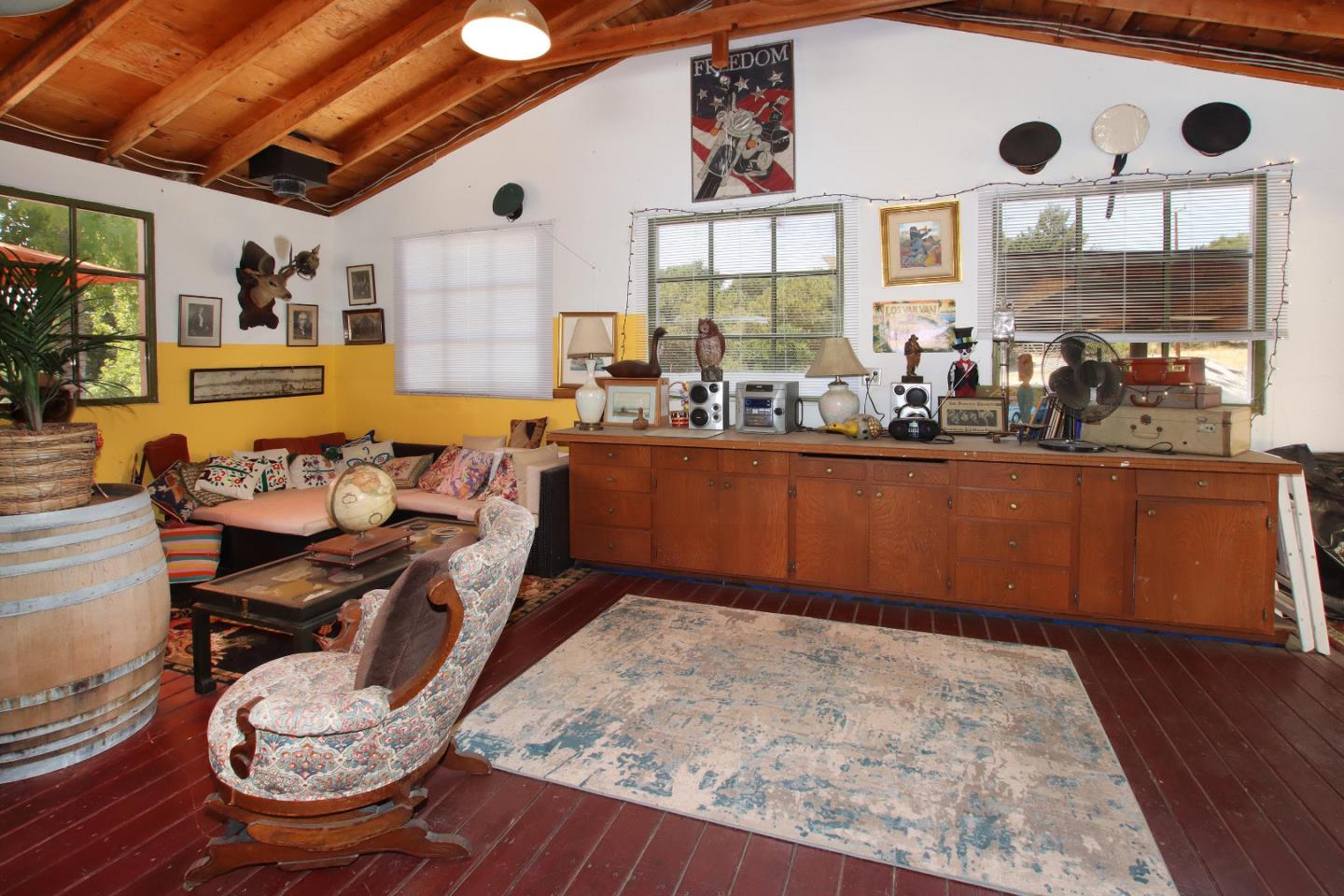 434 Old Smith Road Watsonville, CA 95076 - Photo 46 of 61 a kitchen with wooden floors and wooden cabinets