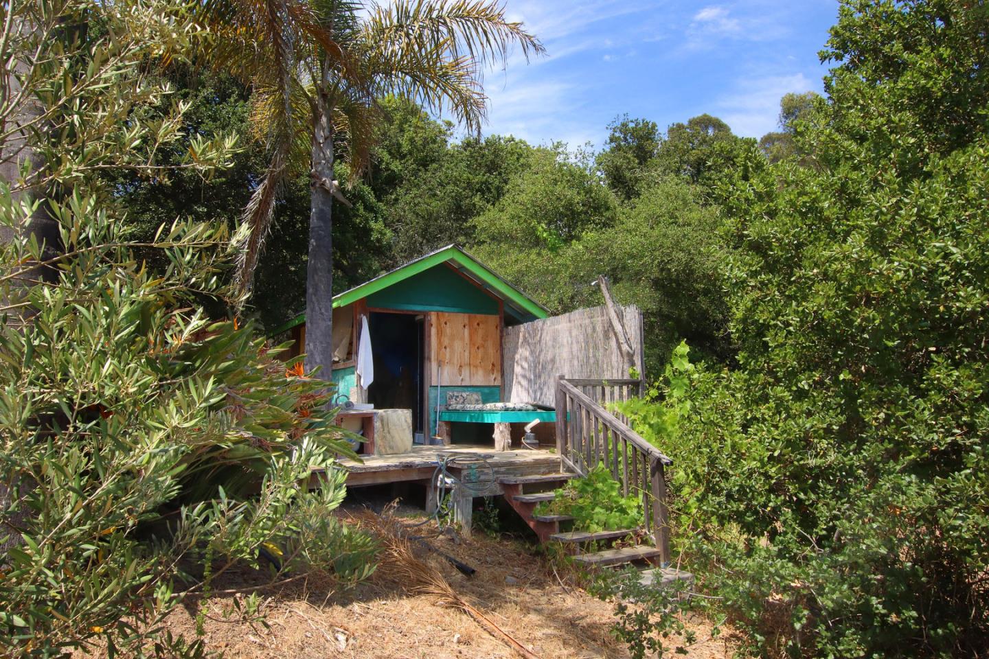 434 Old Smith Road Watsonville, CA 95076 - Photo 8 of 61 a backyard of a house with table and chairs