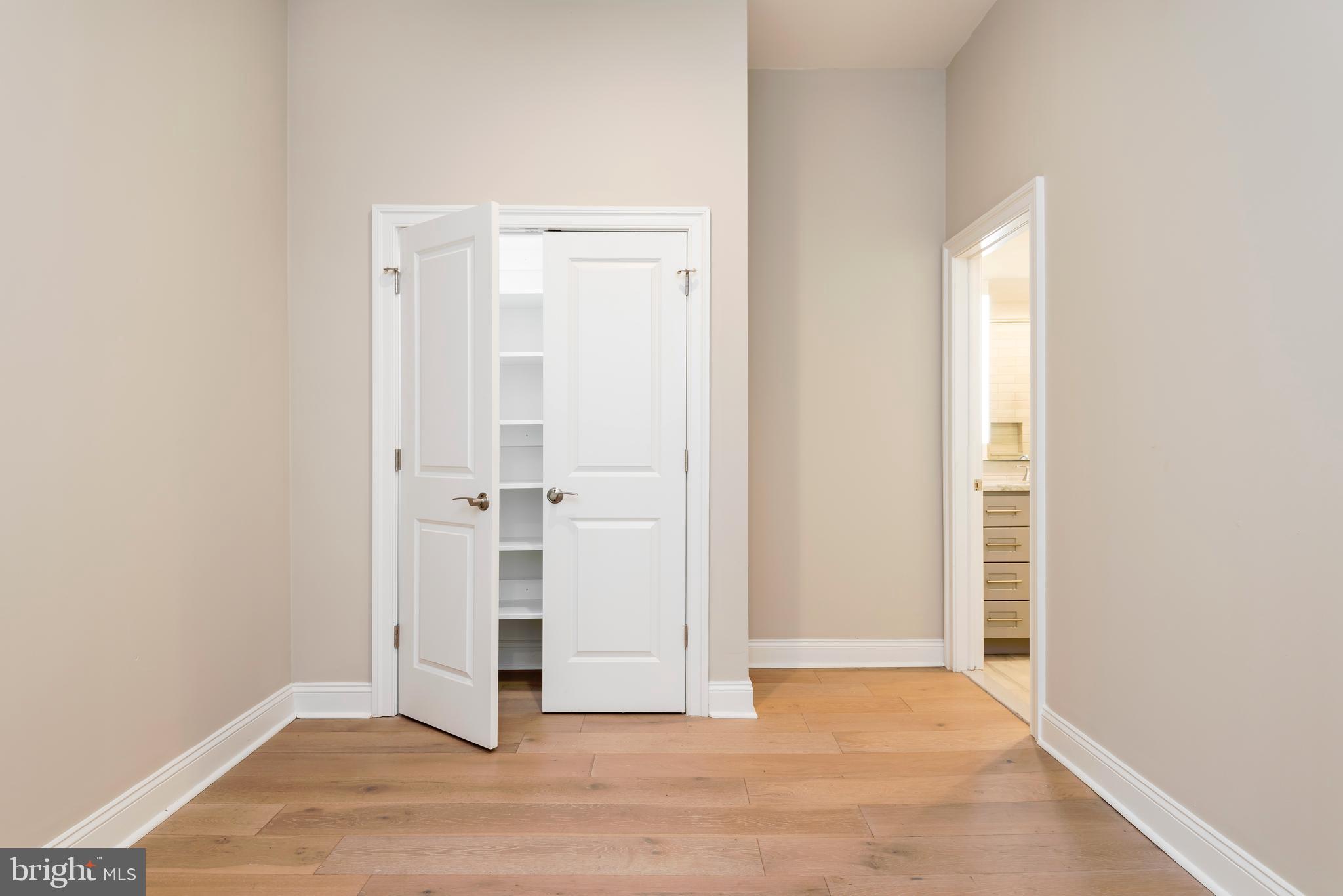 33 Letitia Street, Unit 306 Philadelphia, PA 19106 - Photo 18 of 24 an empty room with wooden floor and windows