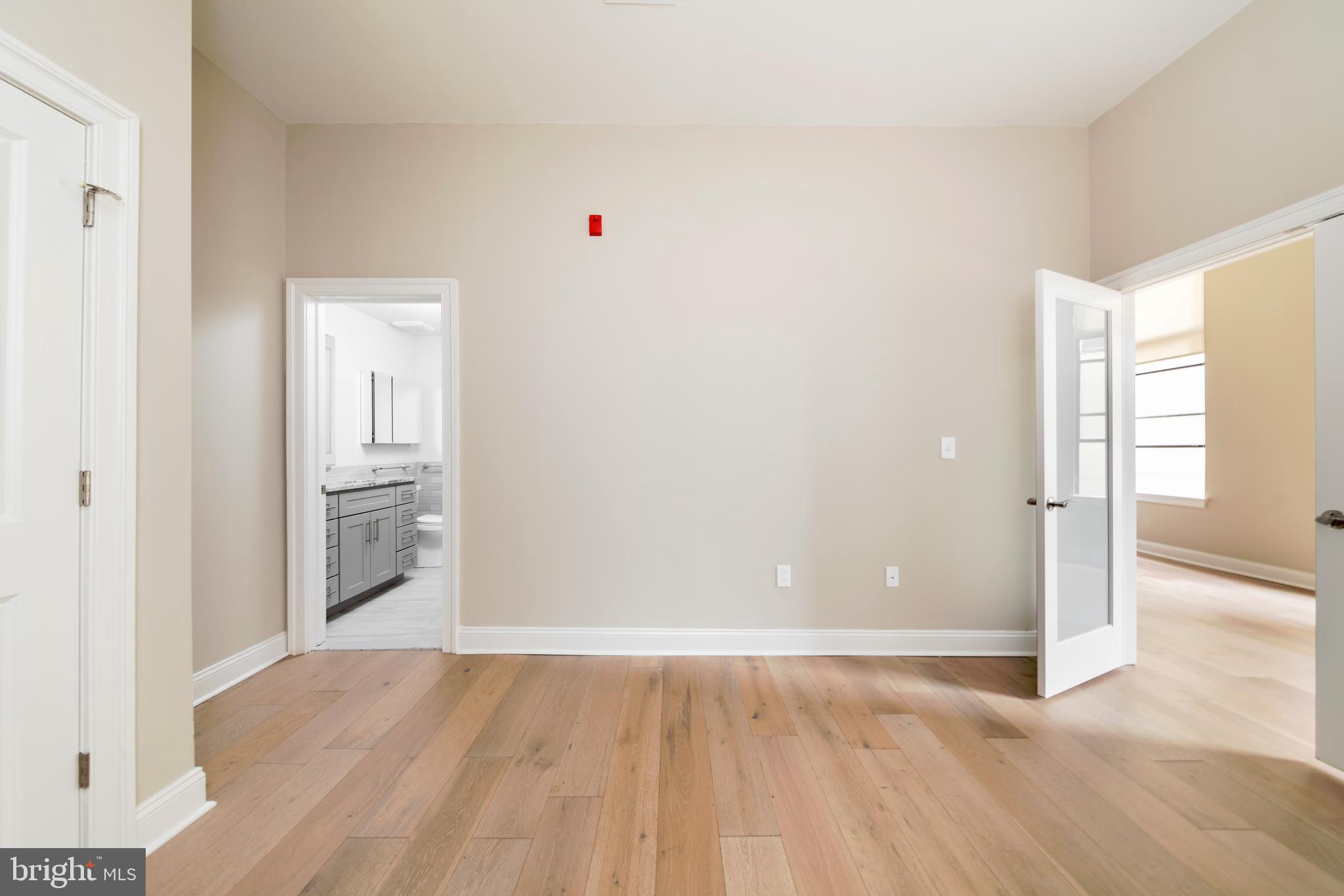 33 Letitia Street, Unit 306 Philadelphia, PA 19106 - Photo 20 of 24 a view of empty room with wooden floor