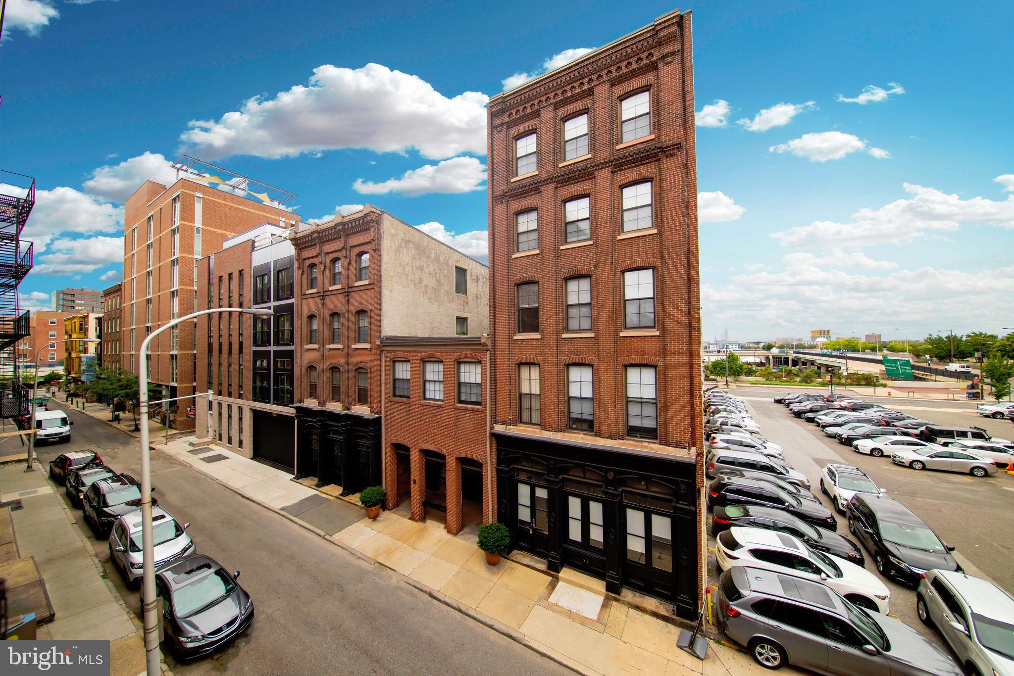 33 Letitia Street, Unit 306 Philadelphia, PA 19106 - Photo 2 of 24 a city street lined with tall buildings and a street